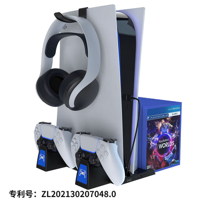Gaming console with headset, controllers, and game case on a white background